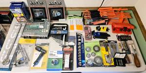 lot 263 image: Table Full of New Tools & Hardware