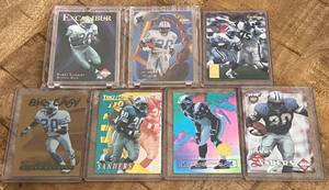 lot 73A image: 7 Barry Sanders Insers and Serial Numbered Football Cards