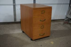 lot 21 image: wood file cabinet