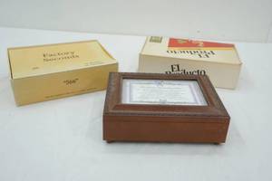 lot 96 image: Musical jewelry box and cigar boxes