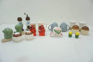 lot 98 image: Ceramic and other salt and peppers