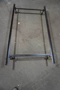 lot 12 image: metal twin bed frame