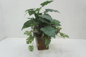 lot 69 image: artificial plants in decorative planter