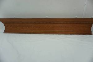 lot 88 image: Wood mantle, 41.5 with hangers on back