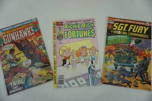 lot 104 image: Vintage comics  Richie Rich, Sgt. Fury and Gunhawks