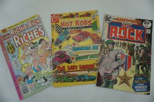 lot 108 image: Three vintage comics, Richie Rich, Hot Rods and Sgt. Rock