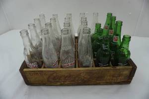 lot 139 image: 7-up, Sunrise and Sunny Sky bottles