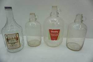 lot 141 image: Vintage bottles, Mogen David, half gallon and other
