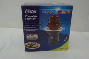 lot 143 image: Oster chocolate fountain
