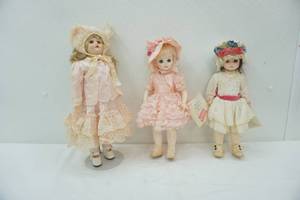 lot 185 image: Vintage dolls (one with porcelain face), blinking eyes and original clothes