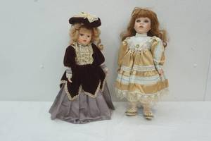 lot 191 image: Victorian dolls in original garb