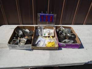 Qty of 3 flats of casters & electrical. As shown.