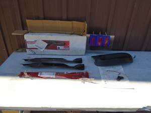 Craftsman 42� mulching blades & cover. As shown.