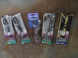 5 reading glasses with cases...