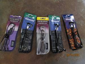 5 reading glasses with cases...