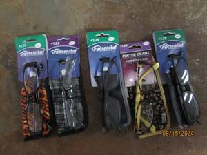 5 reading glasses with cases...