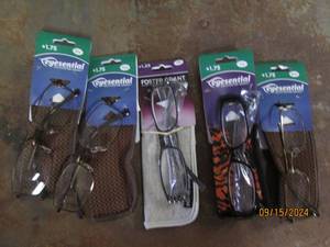 5 reading glasses with cases...
