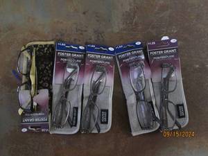 5 reading glasses with cases...