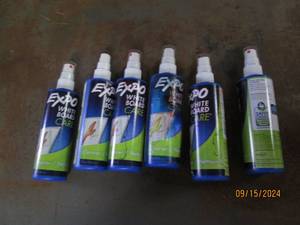 6 bottles of white board care...