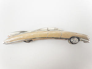 lot 10-132 image: BOB MACKIE Pink Cadillac Car Sedan 4-Door Silver Tone Base Metal Brooch .
