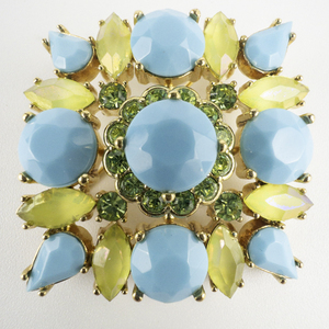 lot 136 image: Joan Rivers Gorgeous Blue & Green Gold Tone Base Metal Brooch .