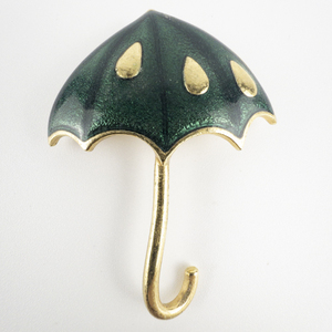 lot 141 image: Beautiful Green Enamel Umbrella Gold Plated Base Metal Brooch .