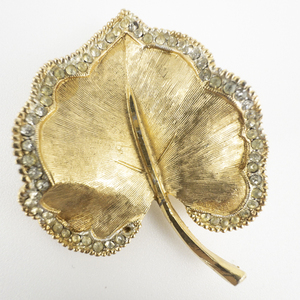 lot 159 image: BSK (Steinberg, Slovitt, Kaslo)  Satin Leaf With Stylized CZ Border Gold Tone Base Metal Brooch .