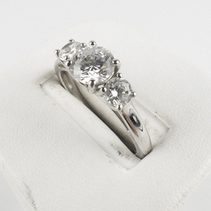 lot 218 image: Three Stone Round Cut CZ Sterling Silver Engagement Style Ring. Size 9.75 - 10.