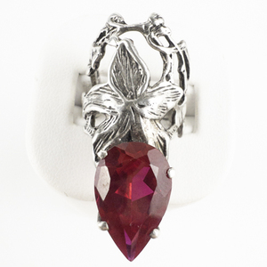 lot 229 image: Floral Setting With Lab-Grown Ruby() Pear Cut Stone Stainless Steel Statement Ring. Size5 - 5.25