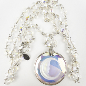 lot 259 image: Kirks Folly Crystal Crescent Moon Child Silver Tone Base Metal Pendant Necklace .