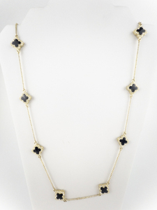 lot 260 image: Black Enamel 4 Leaf Clover Gold Tone Base Metal Station Necklace.