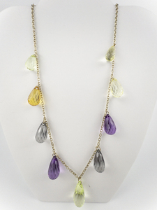 lot 262 image: Multi-Colored Dangling Gemstone Gold Tone Base Metal Station Necklace.