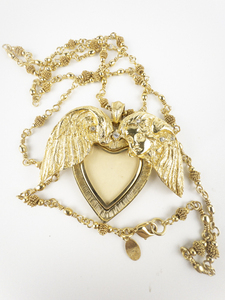 lot 268 image: Kirks Folly Repousse Women Winged Cameo Heart Locket Gold Tone Base Metal Pendant Necklace . I Rest On Your Wings Engraving