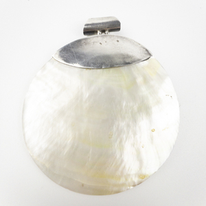 lot 288 image: Huge Mother Of Pearl Disk With Hand Fabricated  Sterling Silver Pendant . 3 Inches Wide