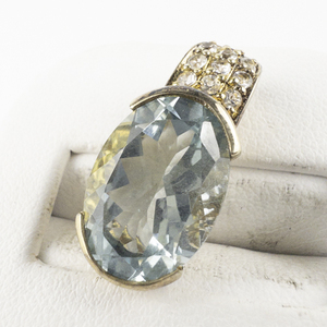 lot 289 image: Oval Cut Sky Blue Topaz() & CZ Vermeil Pendant .