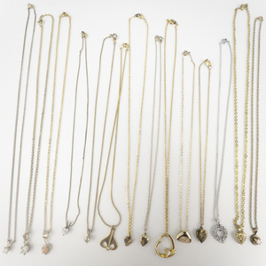 lot 300 image: Group of 13 Solitaire, Heart, Locket Gold Tone Base Metal Pendant Necklaces.