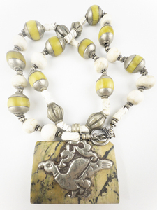 lot 191 image: Stunning Jasper Pendant On Amber And Naga Shell Bead Necklace Base Metal Bead Necklace. Antelope And Pheasant Motifs.