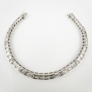 lot 106 image: Ross Simons  Emerald & Round Cut CZ Sterling Silver Tennis Bracelet.