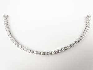 lot 116 image: Stuller Classic CZ White Plated Base Metal Tennis Bracelet. Excellent Condition