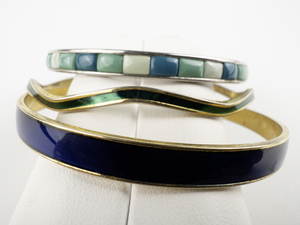 lot 123 image: Group Of Three Enamel Base Metal Bangles.
