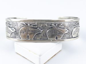lot 15 image: Carolyn Pollack Roderick Tenorio Zuni Bear Sterling Silver Cuff Bracelet.