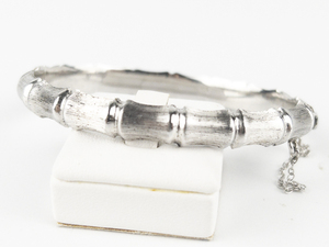 lot 16 image: CPS Jewellery Company (Great Britain)  Textured Bamboo Design Sterling Silver Hinged Bangle.