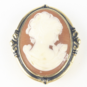 lot 36 image: Estee Lauder  Small Oval Cameo Gold Tone Base Metal CompactTrinket Box .
