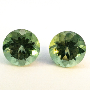 lot 94 image: Pair of GREEN TOURMALINE - 1.75ct. Round brilliant cut