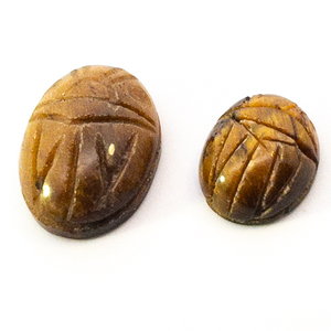 lot 303 image: Pair of TIGER EYE QUARTZ - 7.70ct (total) Oval (Carved Scarabs)