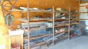 lot 98A image: Mixed Wall of Aluminum and Steel Welding Pieces and Miscellaneous Hardware