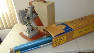 lot 167 image: 8MM Movie Projector with Projection Screen