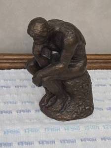 lot 21 image: 10 Tall Thinking Man Figure