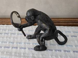 lot 33 image: 8 Tall Monkey Figurine Holding Mirror