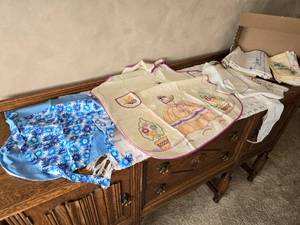 lot 48 image: Embroidered Aprons and Hand Towels